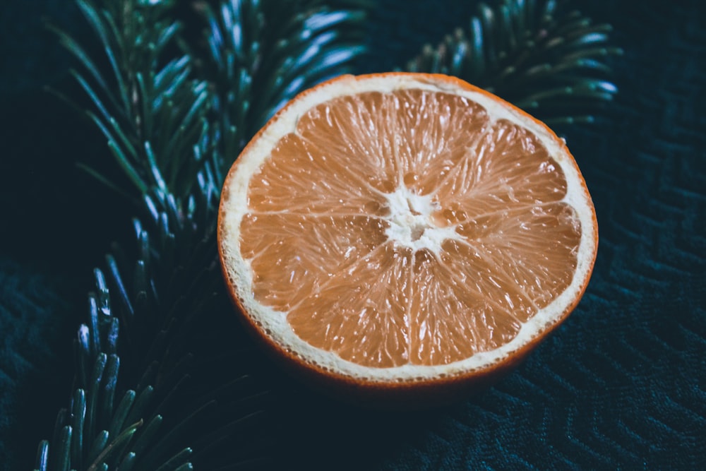 orange fruit on black linen