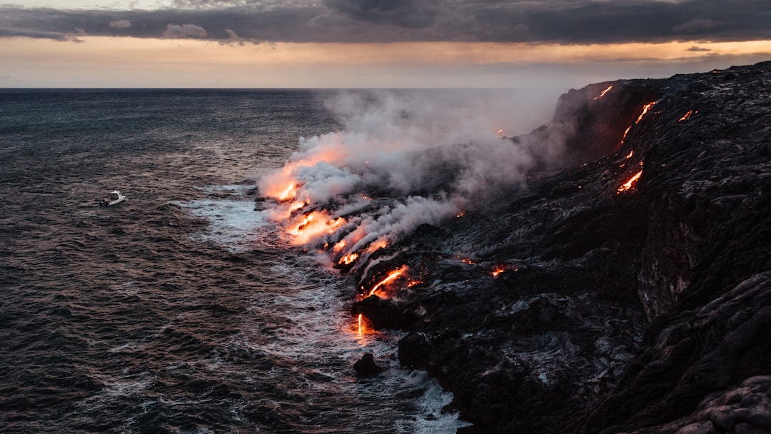 red lava, Lava from the Kilauea volcano hitting the ocean.