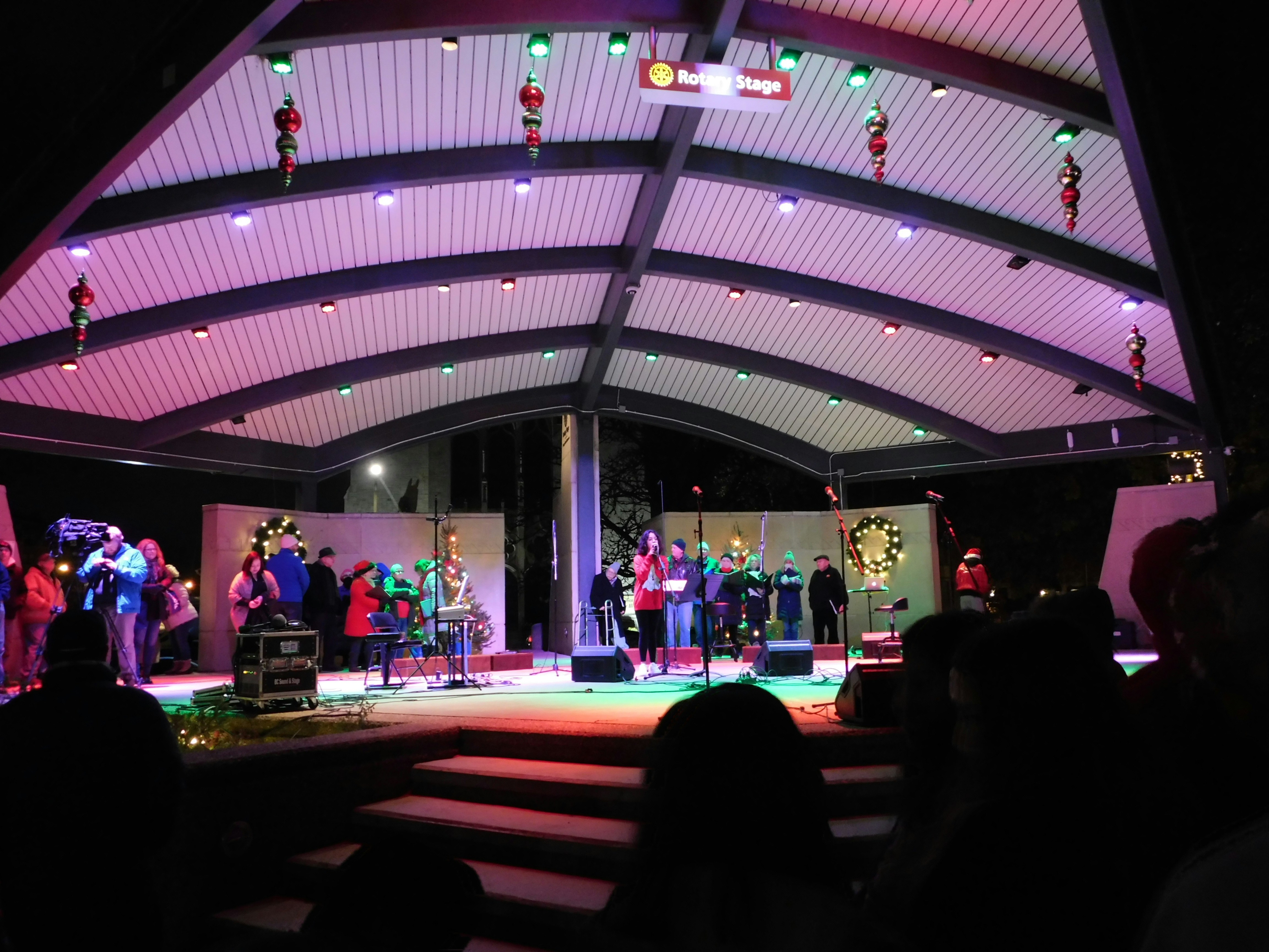 people on lighted stage