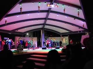 people on lighted stage