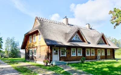 brown and gray concrete house during daytime cottage google meet background