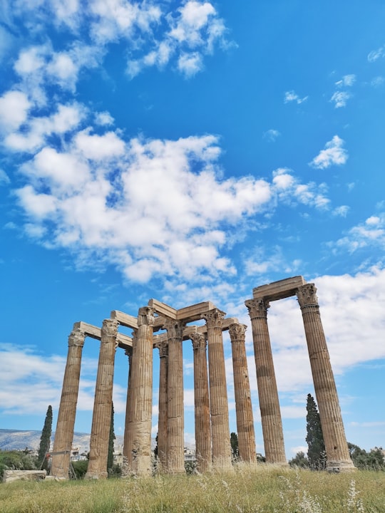 beige concrete structures in Temple of Olympian Zeus Greece