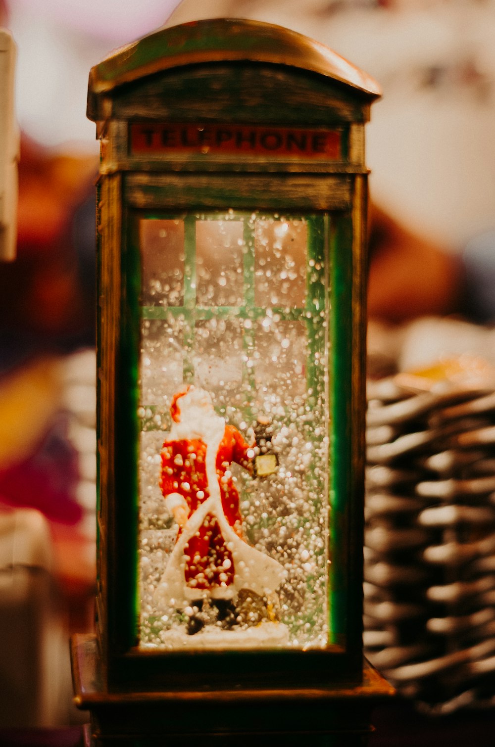 Santa Claus on the telephone booth table decor