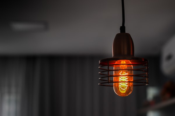 Lampada a sospensione in vetro ambrato