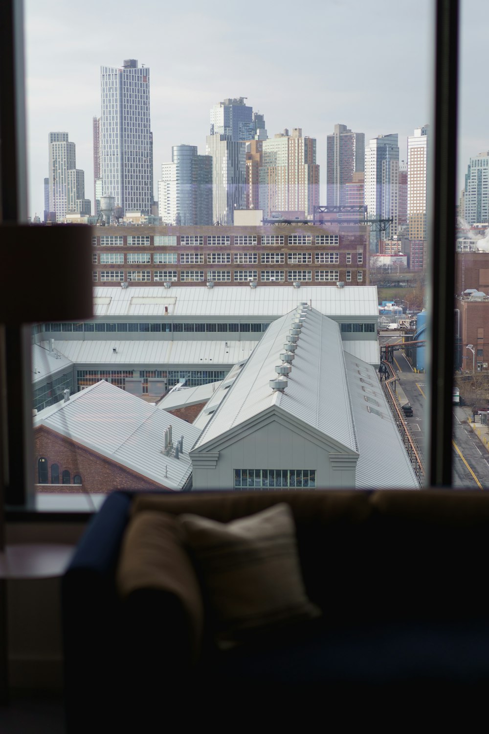 buildings through clear glass window