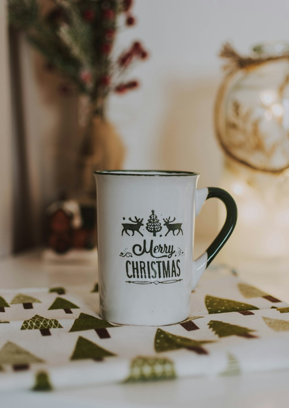 white and black Merry Christmas-painted mug