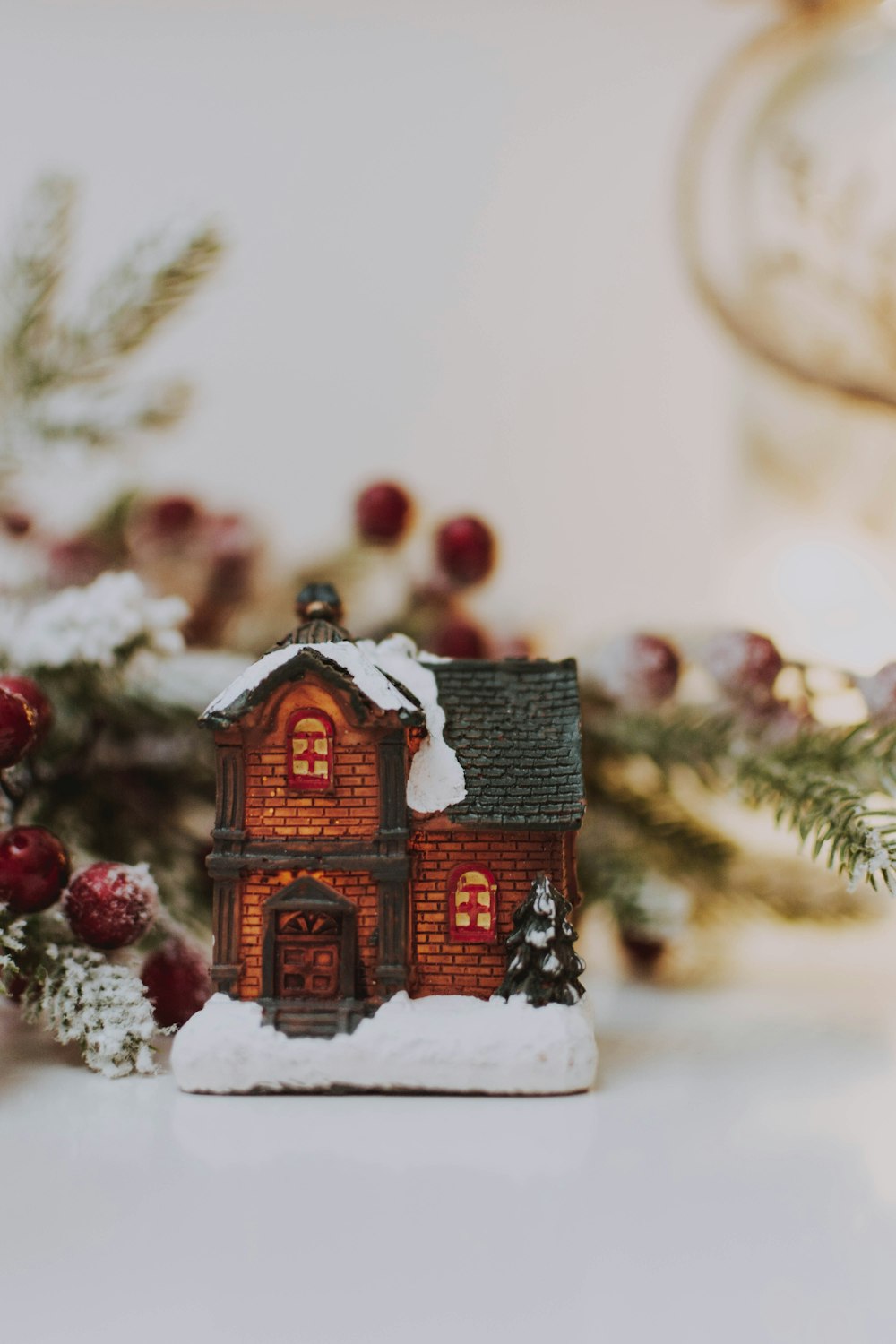 shallow focus photo of brown 2-story house ceramic miniature