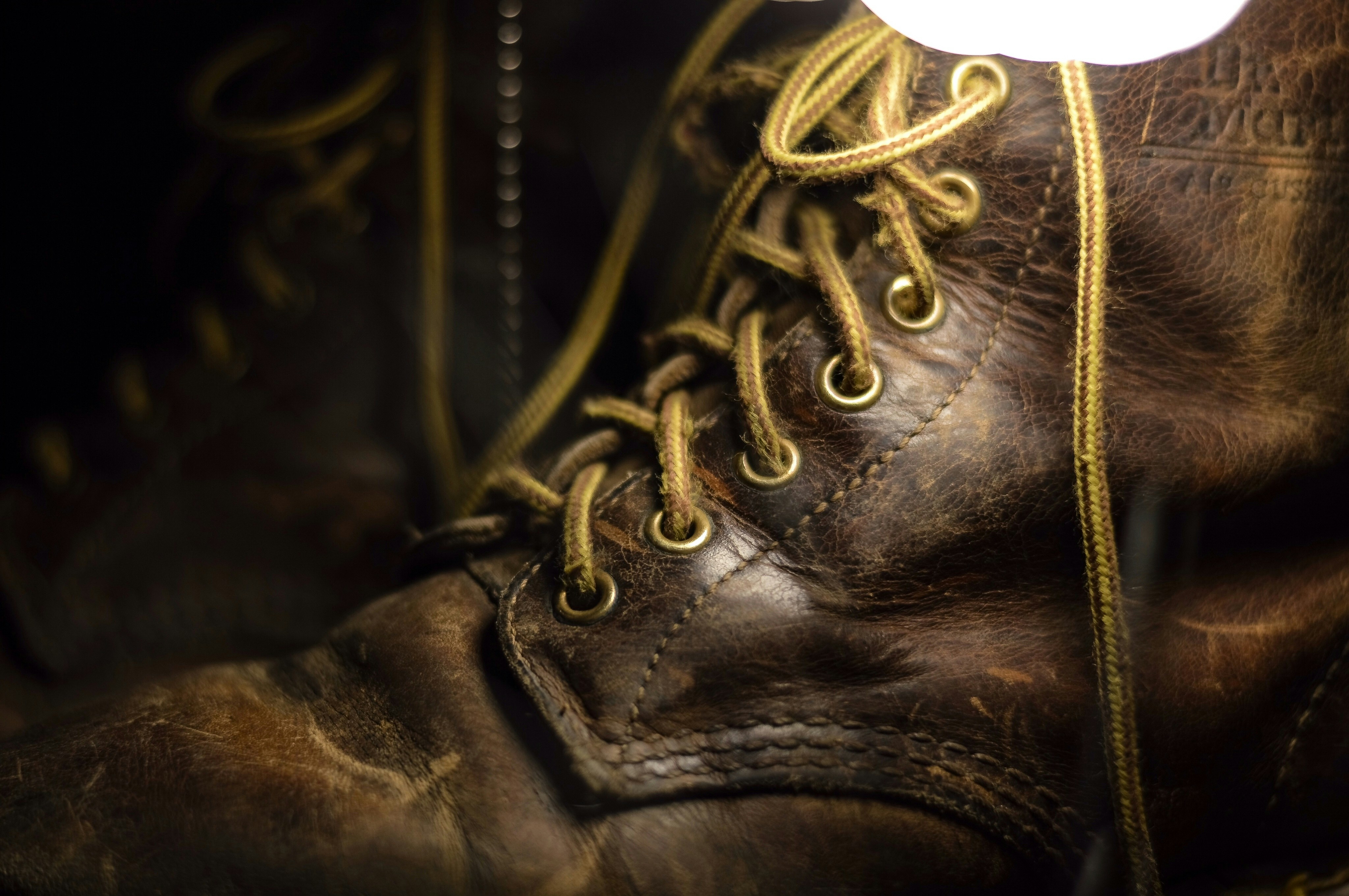 a close up of a pair of brown boots