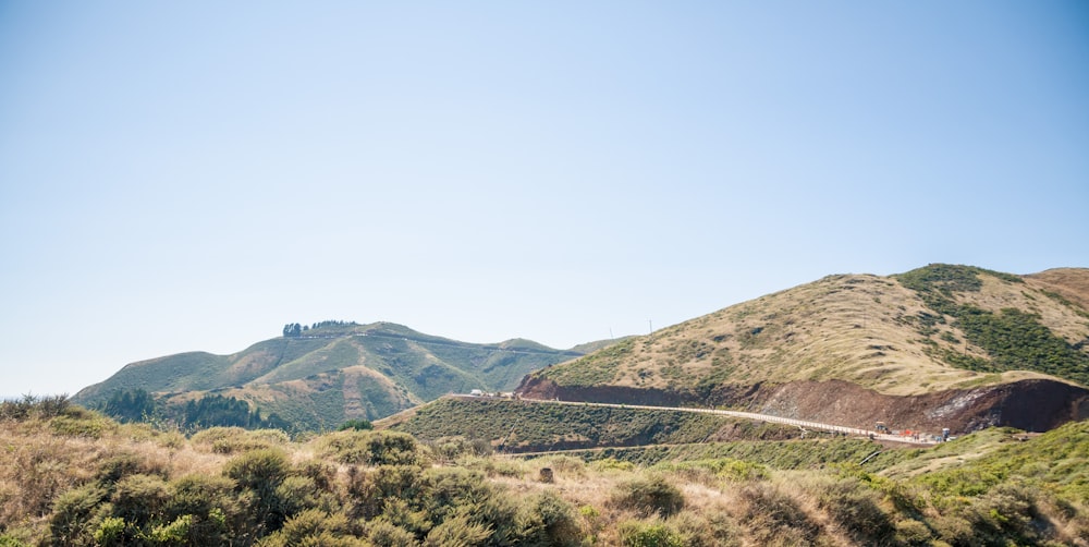 brown and green mountains during daytime