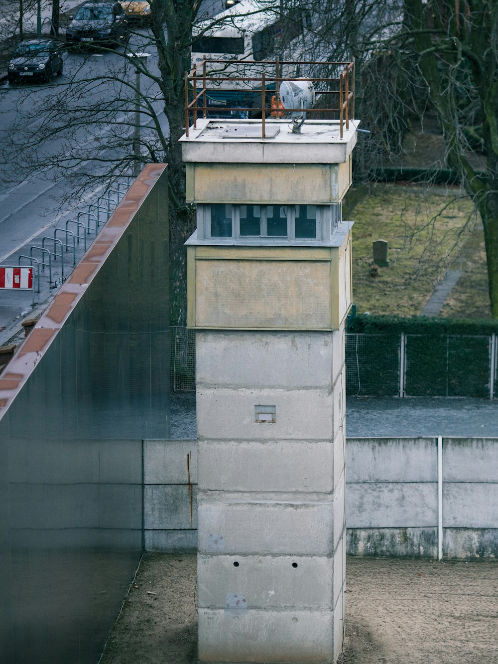 gray concrete tower near wall