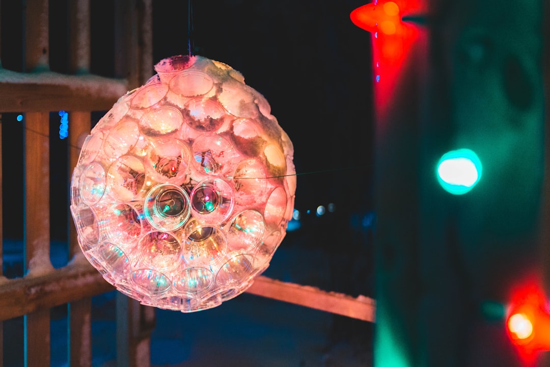 selective focus photography of lighted wreath