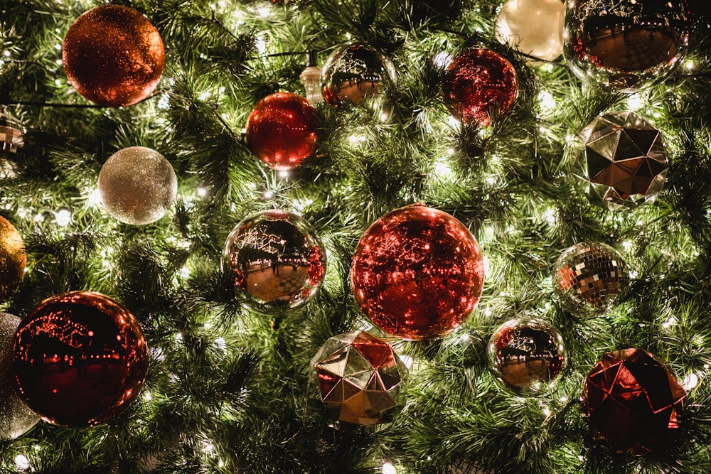 red and yellow bauble ball on the christmas tree