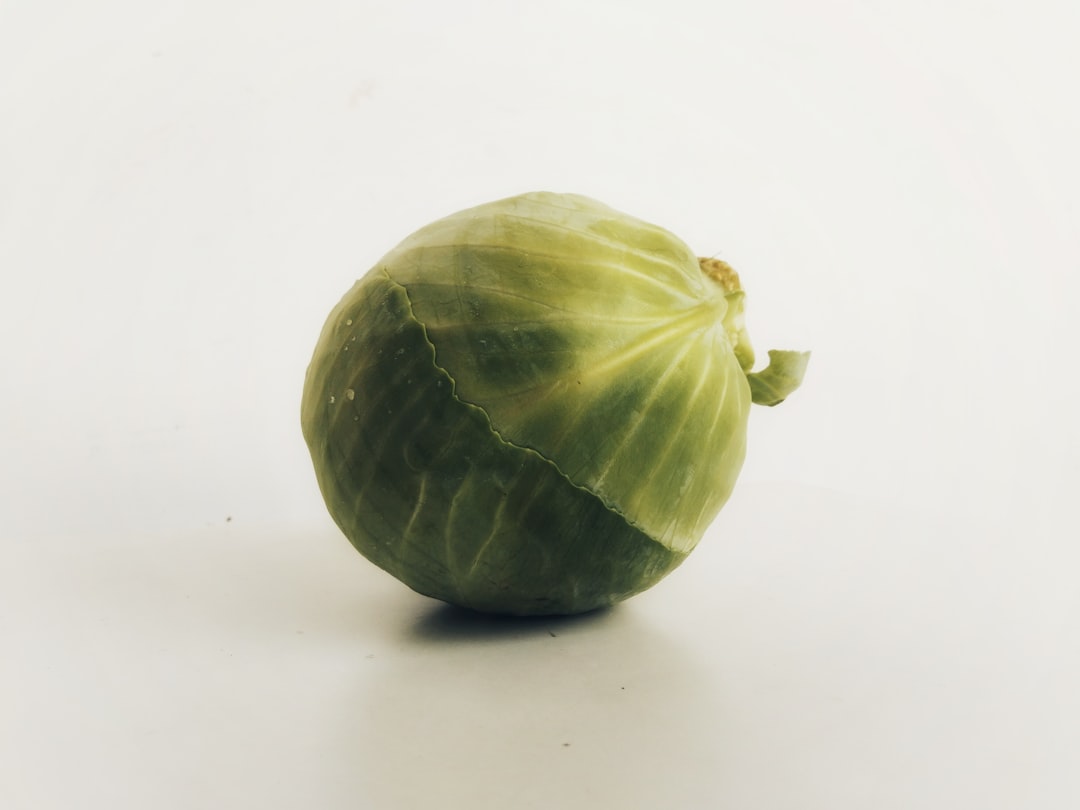 round green vegetable on white surface