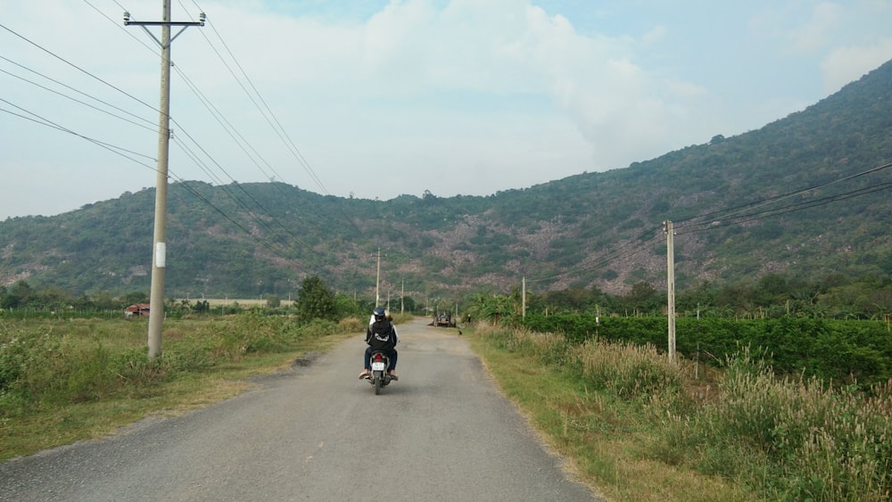 person riding motorcycle photograph