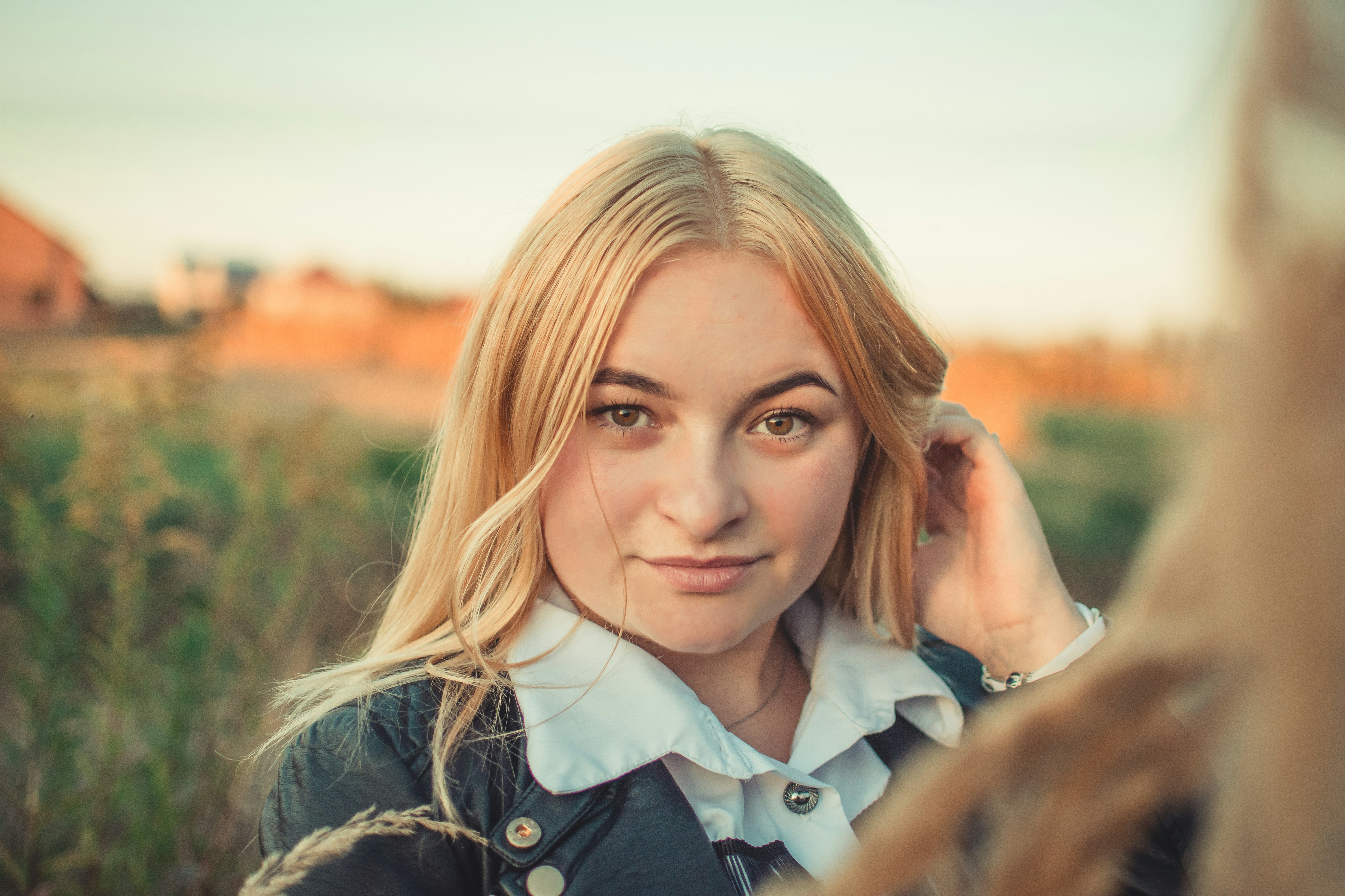 woman wearing blue jacket screenshot