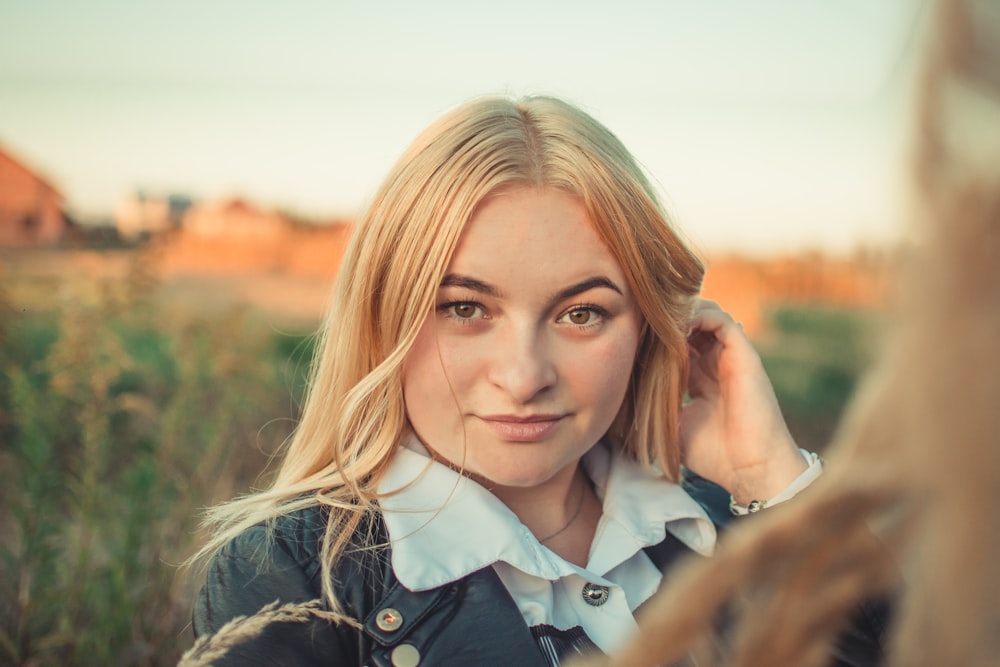 woman wearing blue jacket screenshot