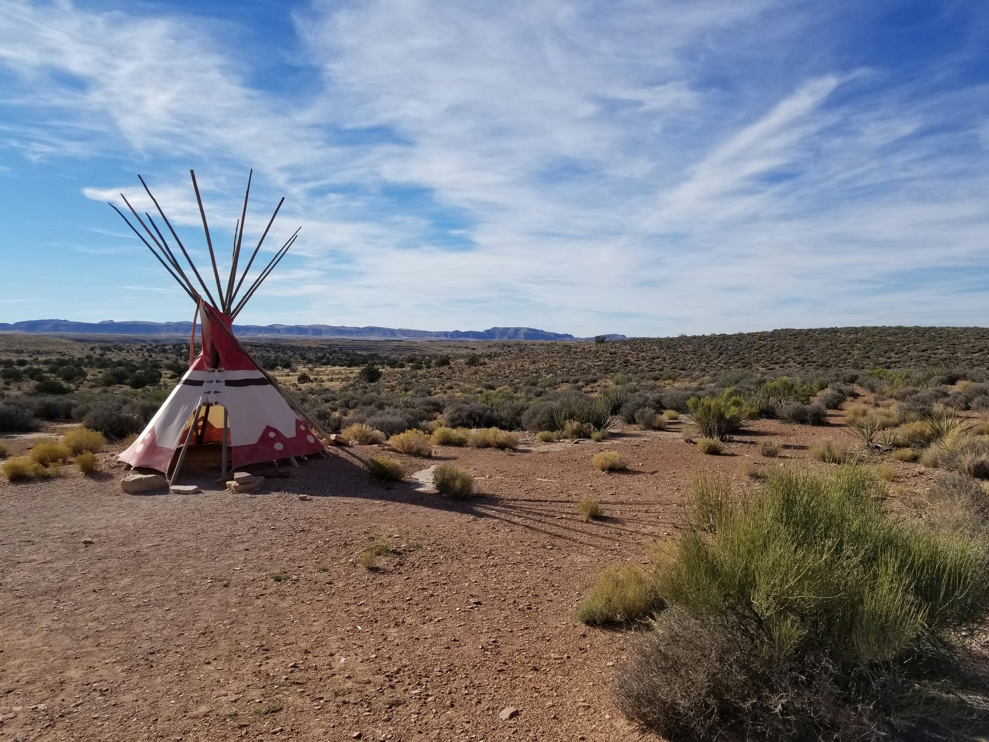 white and red striped tipi hat during daytime