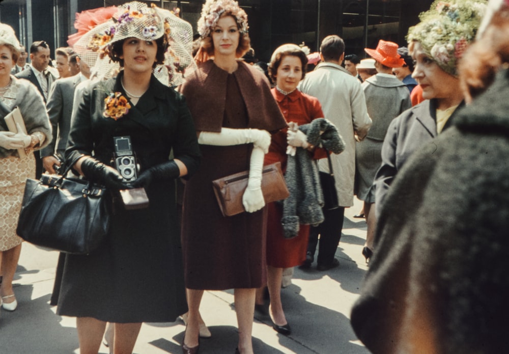 a group of women standing next to each other