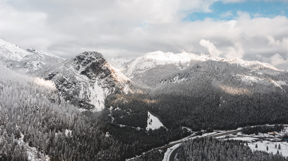 mountains under cloudy sky