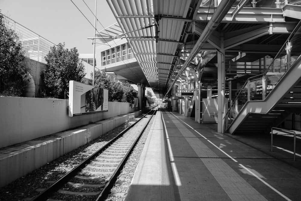 grayscale photo of railroad