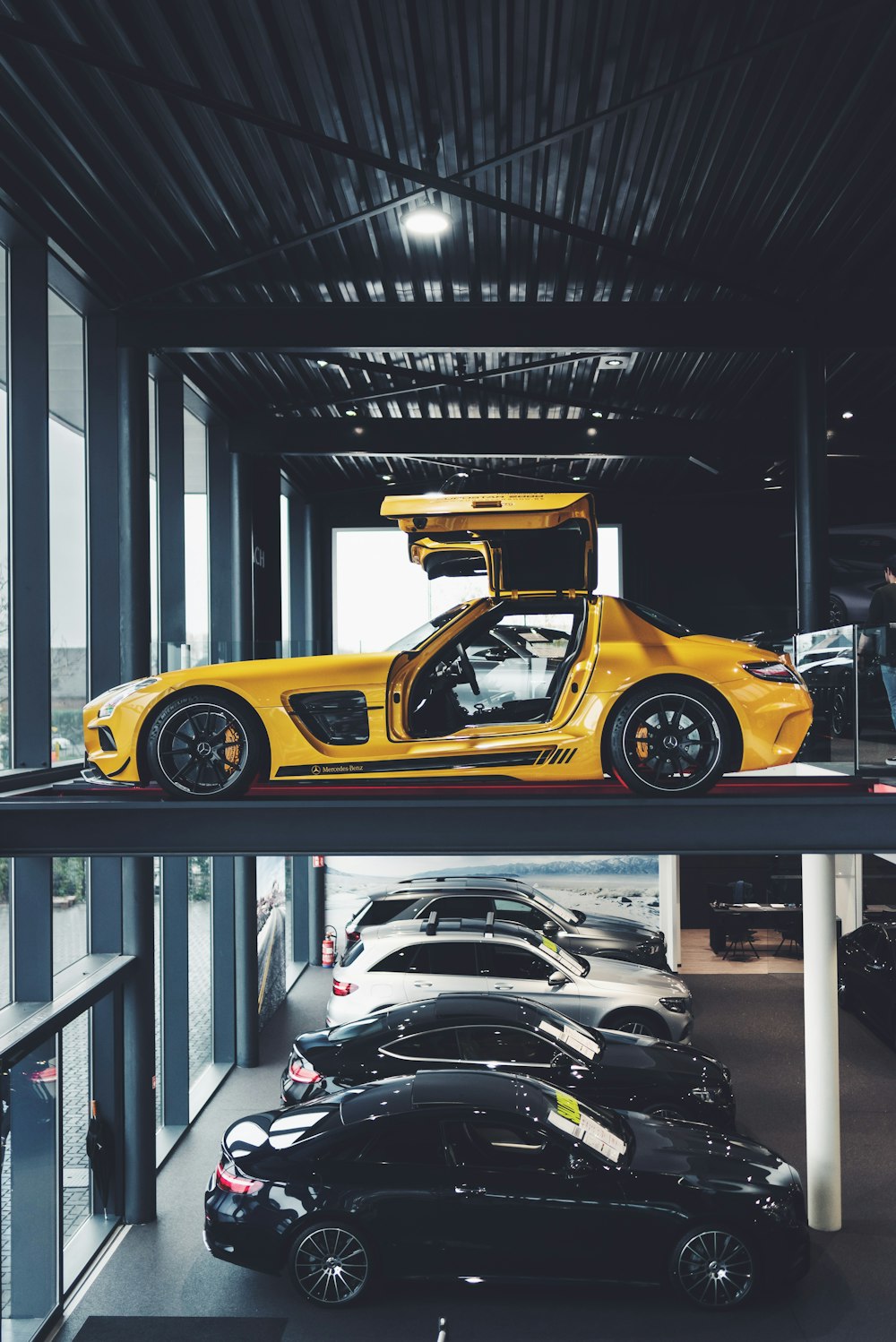 shallow focus photo of yellow coupe