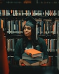 woman holding books
