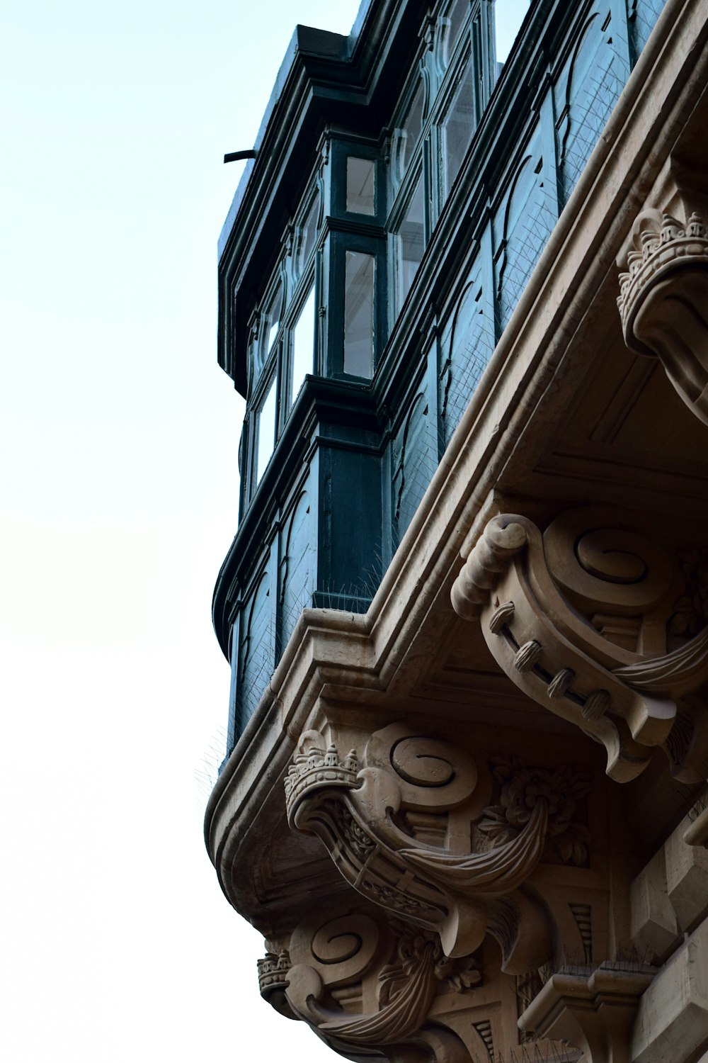 architectural photography of brown and blue building