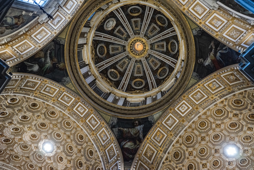 View of the ornamented domes and ceilings of the Basilica di San Pietro church in the Vatican.