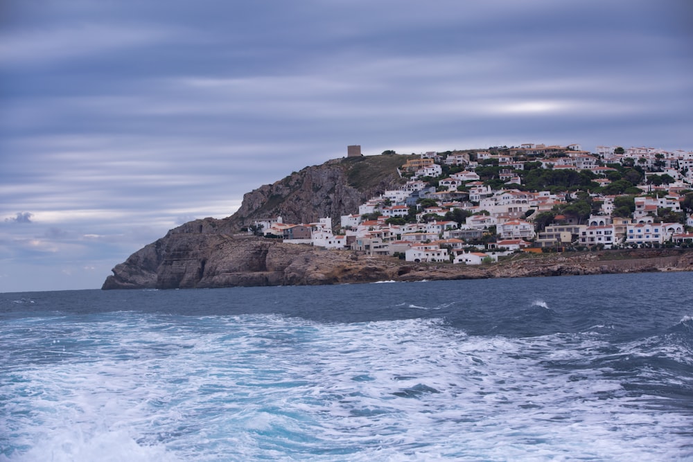 photography of buildings on top of mountain during daytime