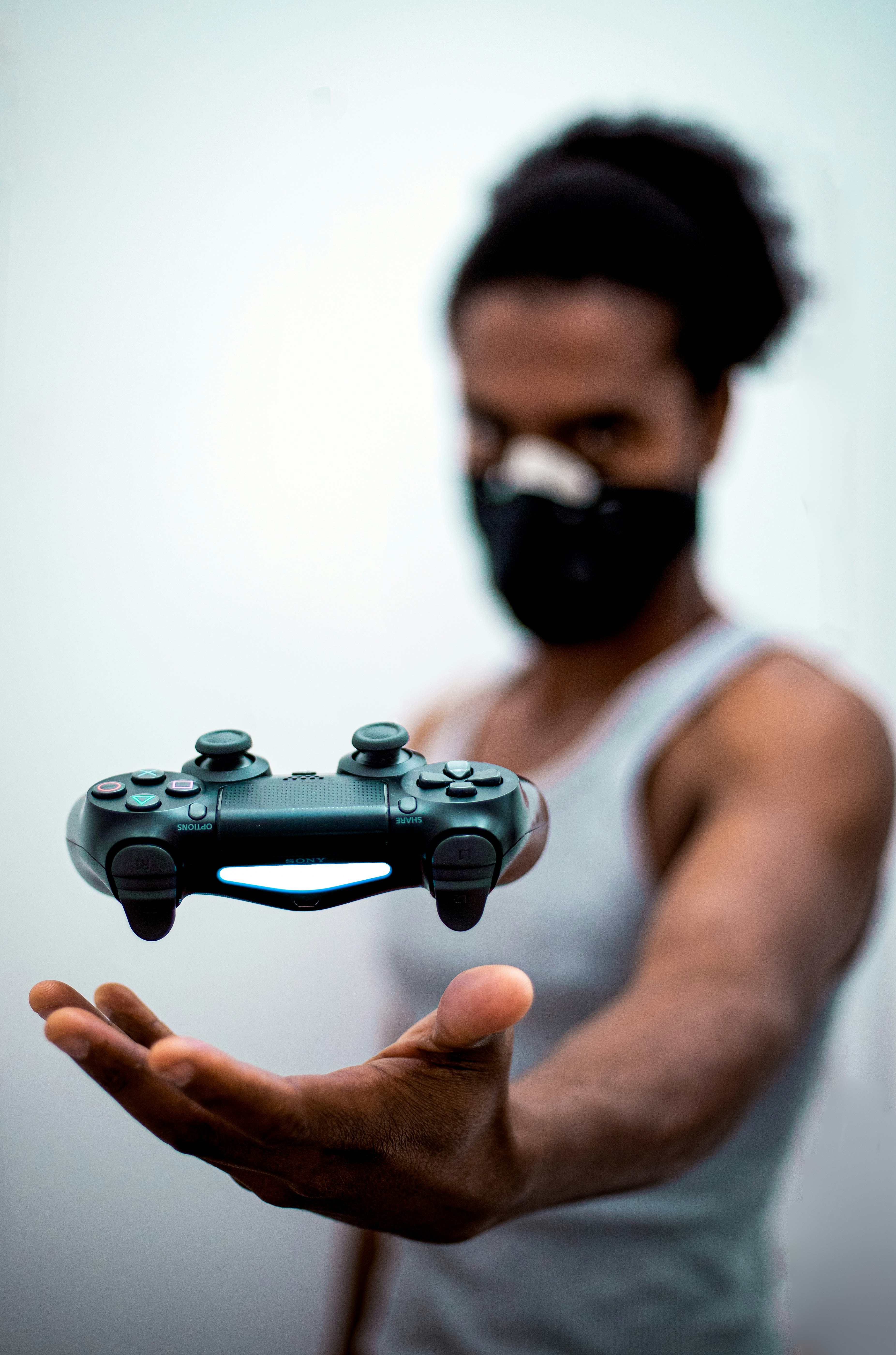 man tossing game controller. Representative of gaming and esports across the world