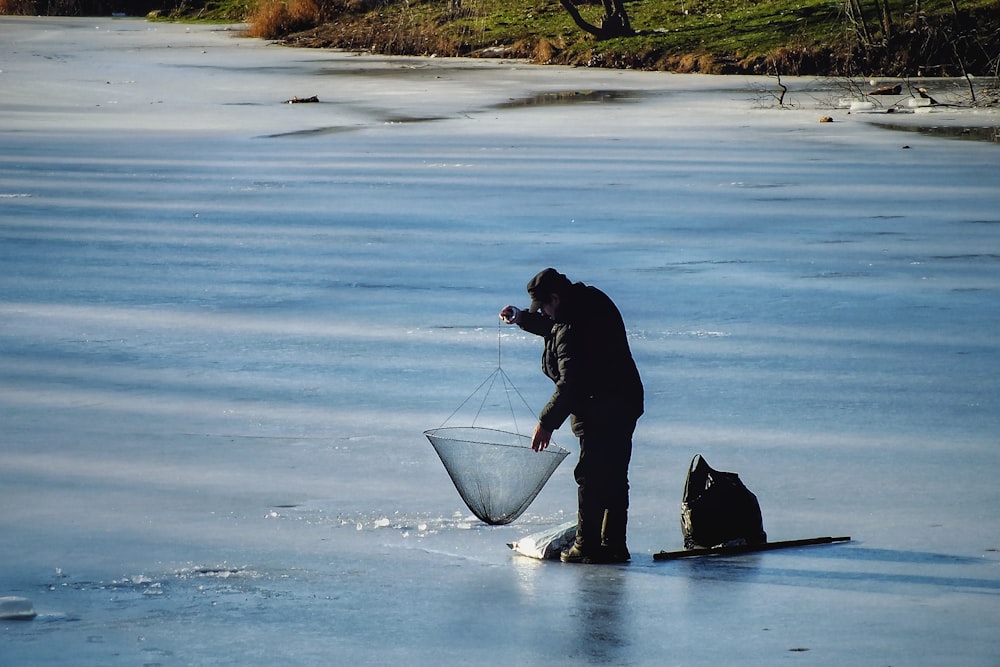 man catchin fish