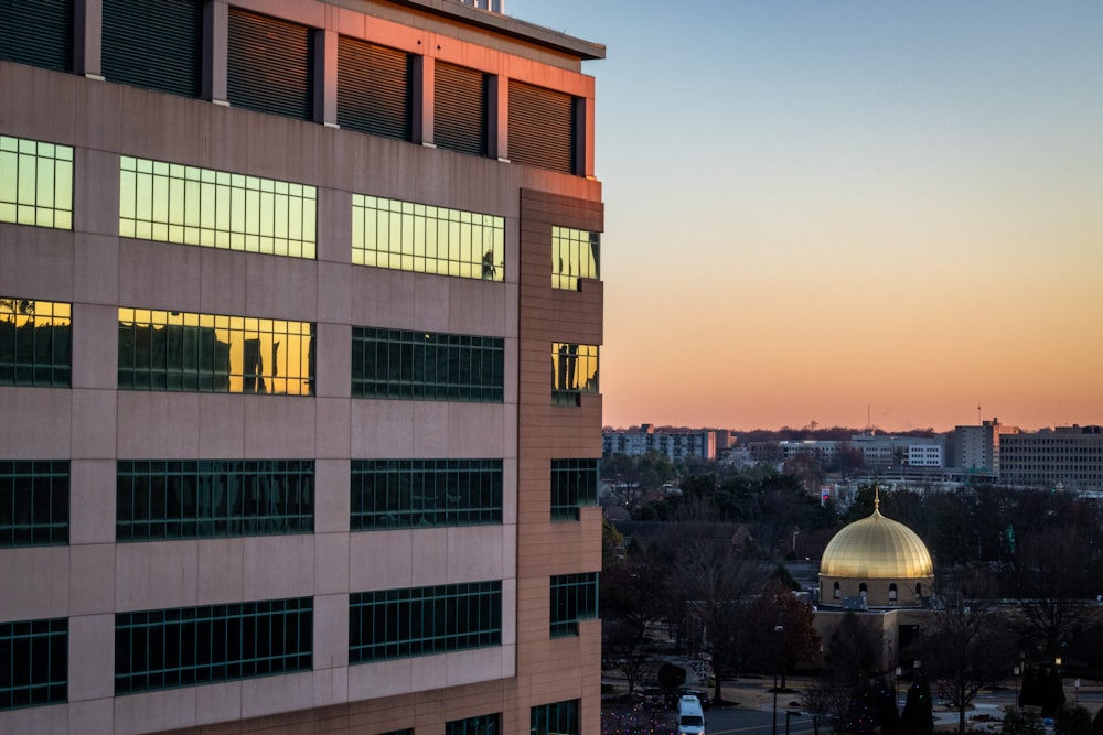 a tall building with a dome on top of it