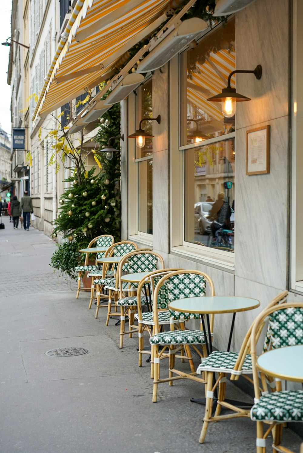 empty chairs and tables outside building