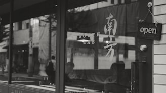 A business storefront with a secure lock symbol, representing business insurance.