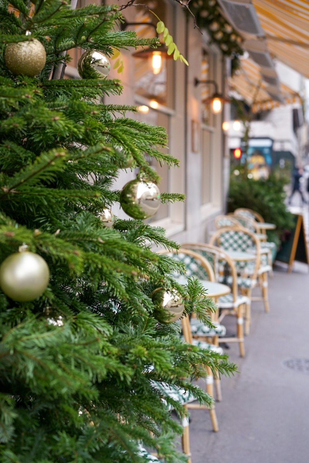 gold baubles hanging on tree