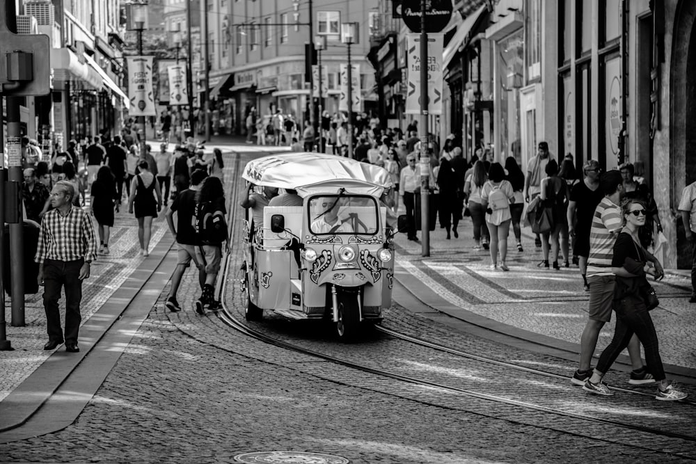 grayscale photo of autorickshaw on road