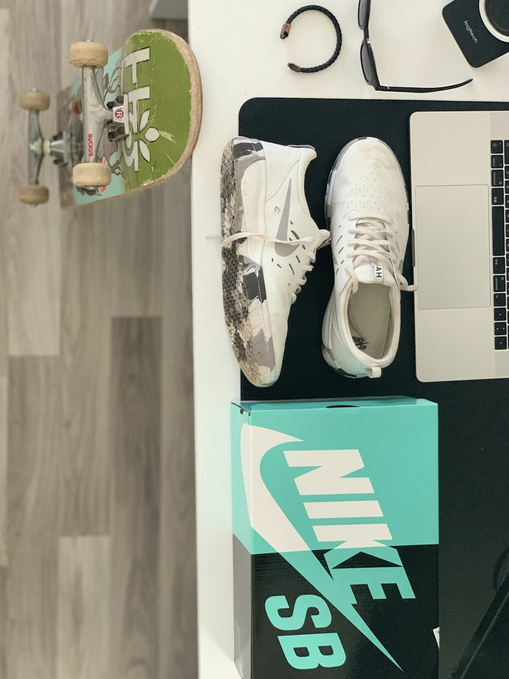 Nike low-top sneakers on desk