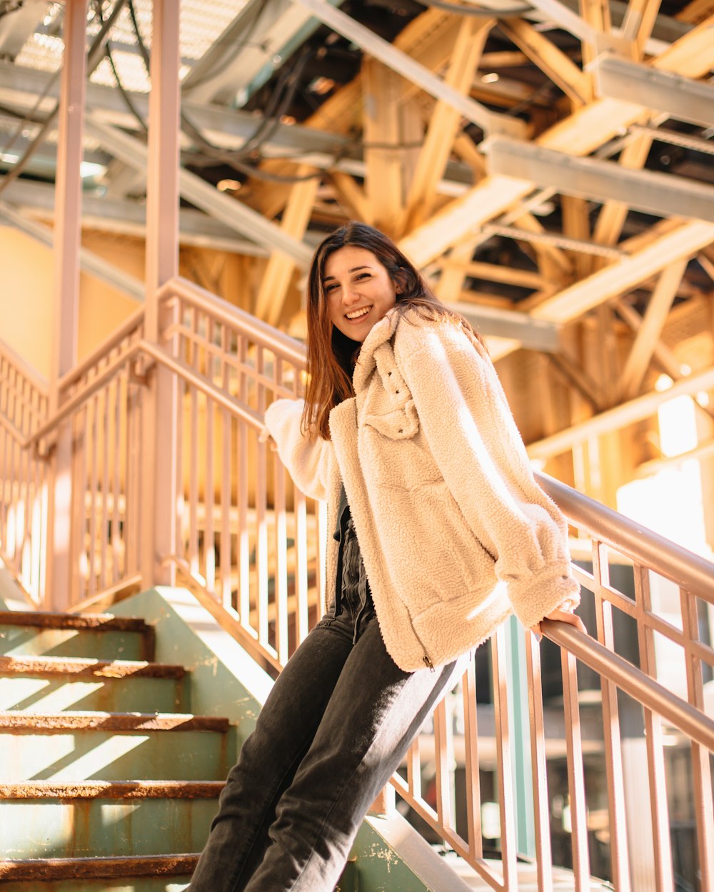 woman wearing white pea coat