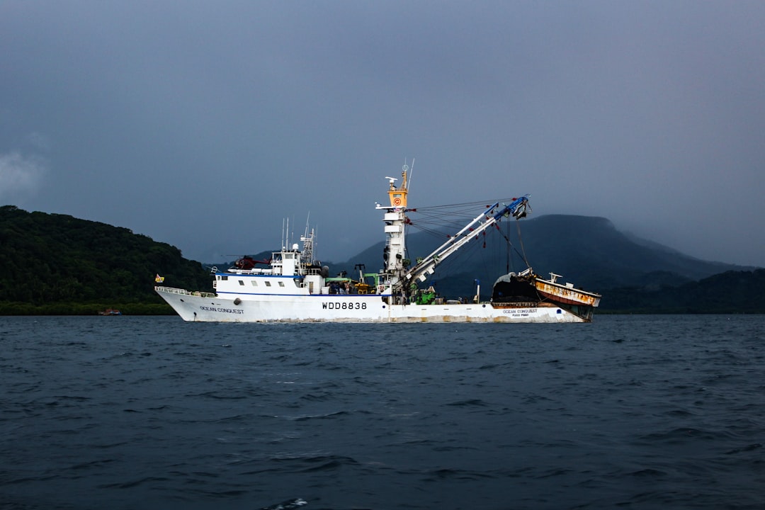 sailing white fishing boat,