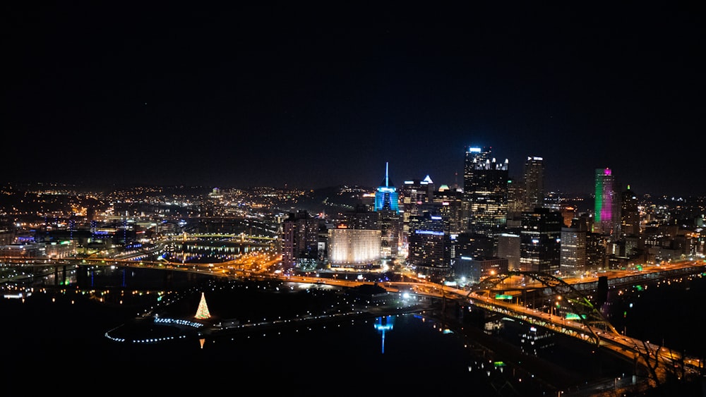 high-rise buildings with lights