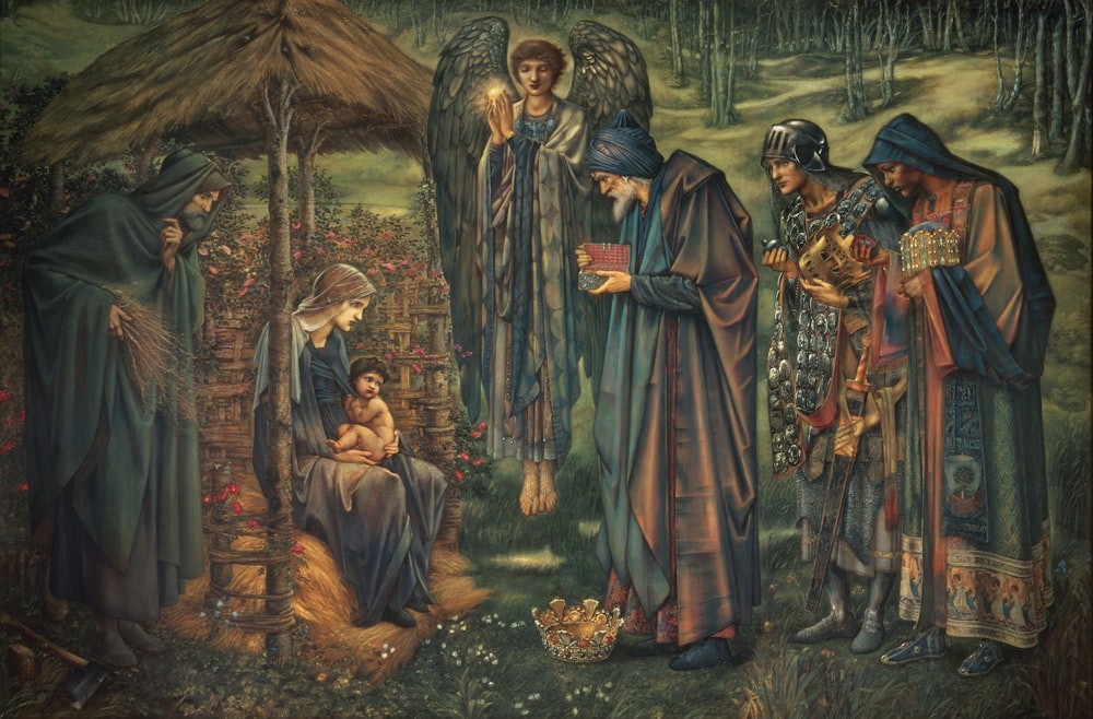 nacimiento de Jesucristo con tres reyes y pintura de ángel