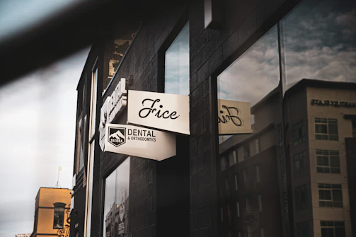 Modern office building exterior with clear signage of Novadent in Abancay