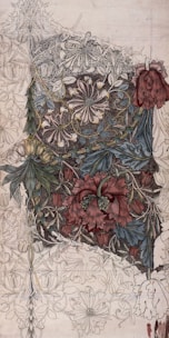 a drawing of a piece of cake with flowers on it