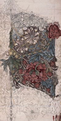 a drawing of a piece of cake with flowers on it