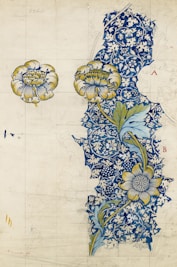 white and blue floral textile