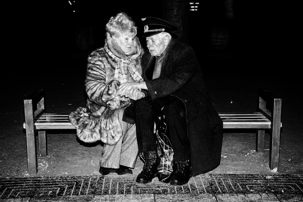 couple sitting on bench