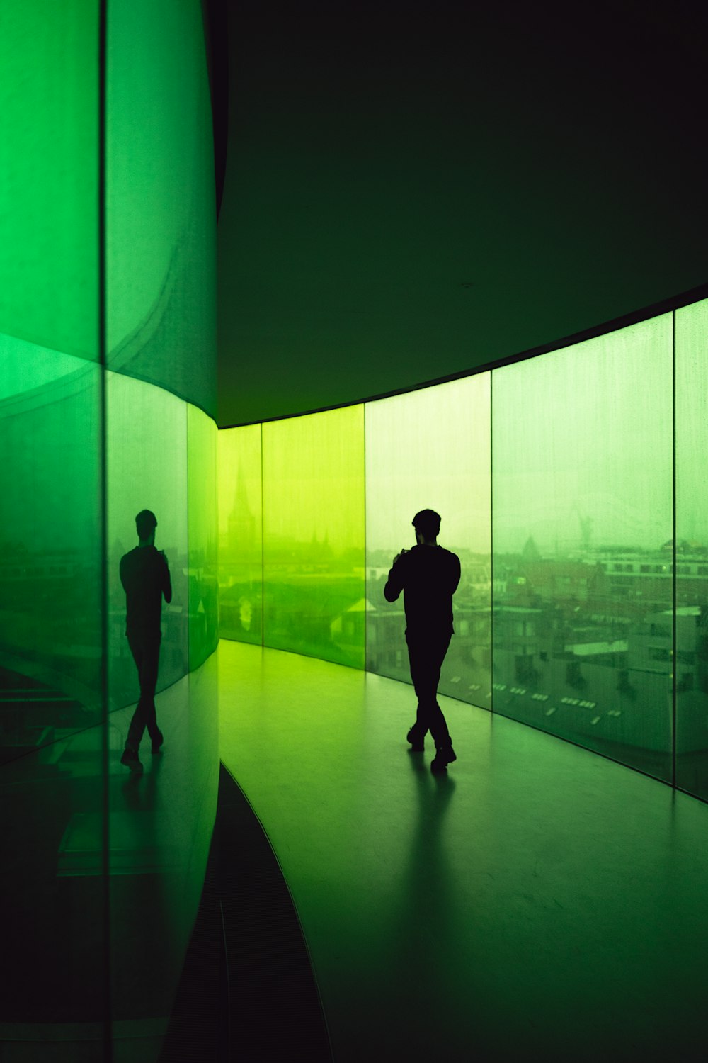 man walking on the building pathway