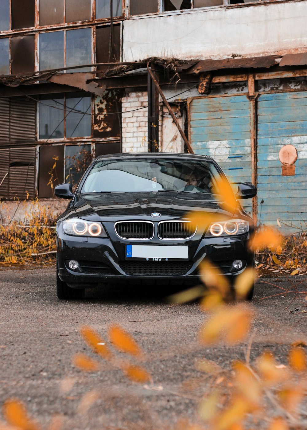 black BMW car near building during day