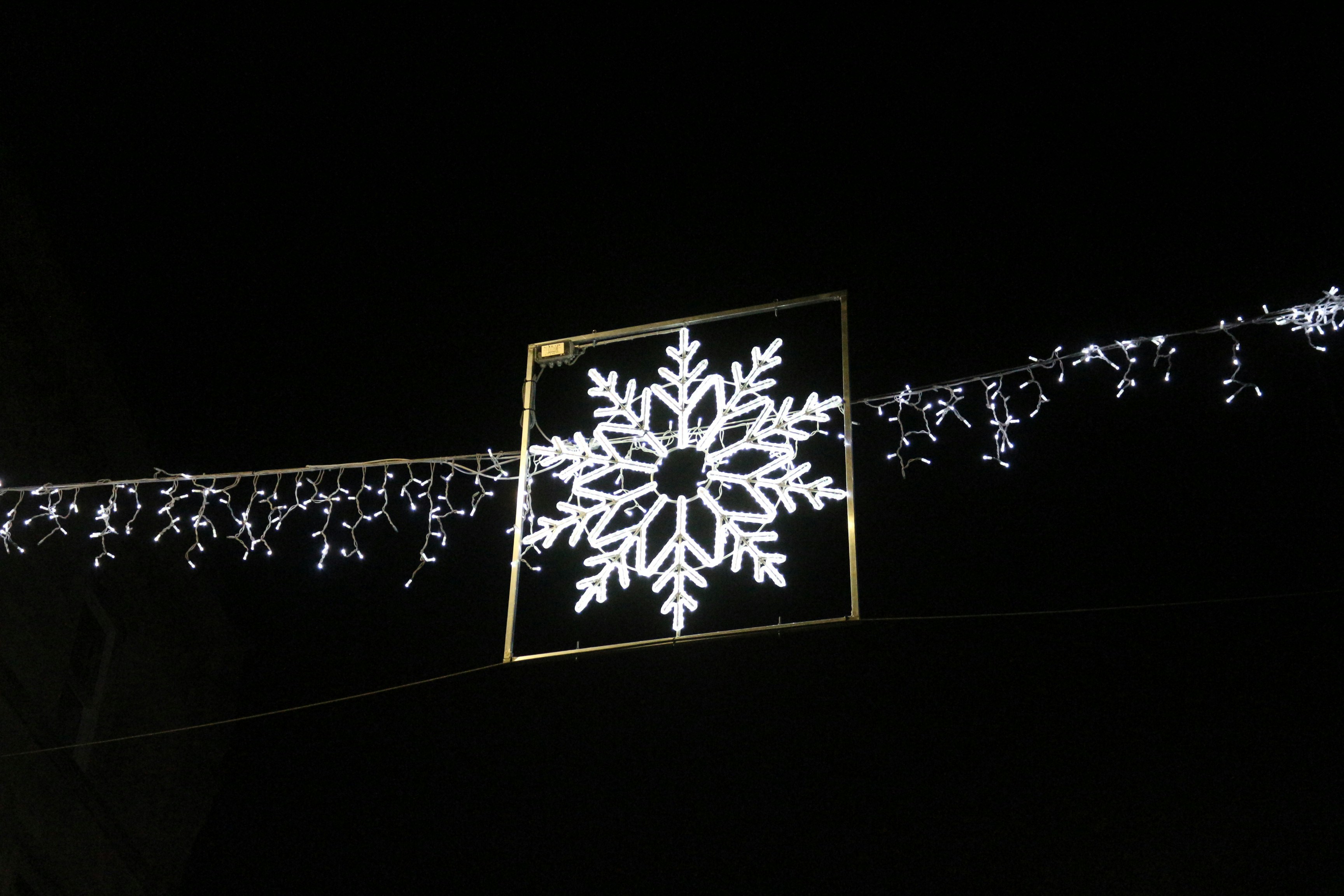 hanging led snowflake turned on decor snowflake teams background