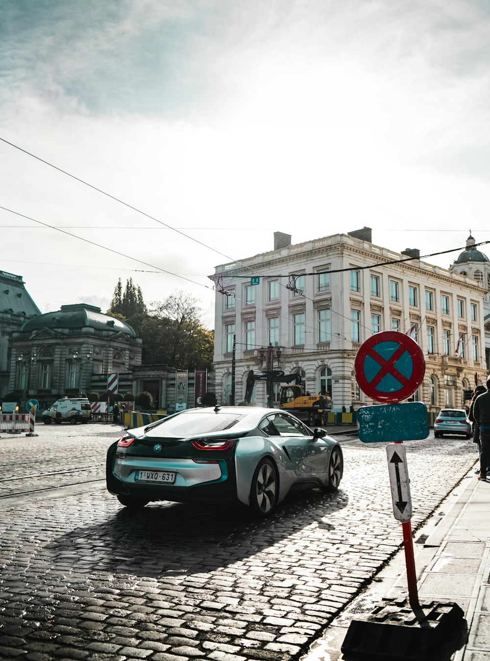 silver coupe on road during daytime